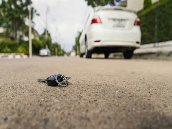 key dropped on the road